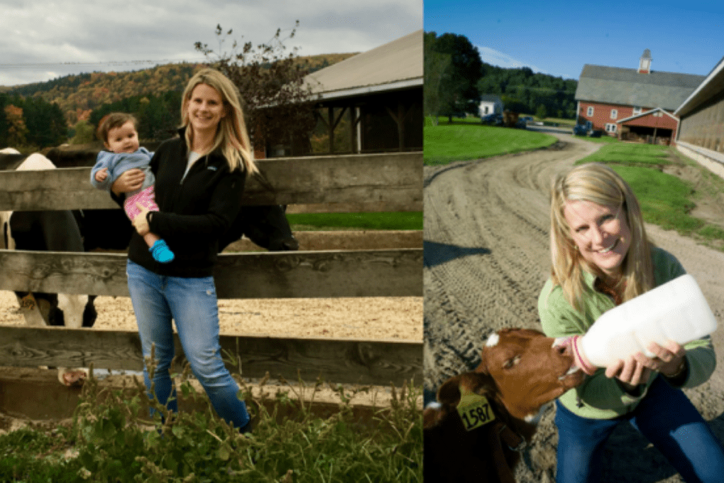 blond woman carrying child and feeding calf