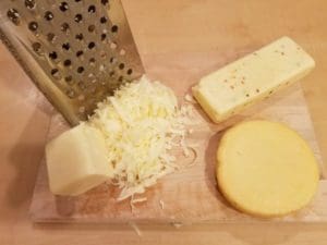 Cheese grater with 3 different cheeses