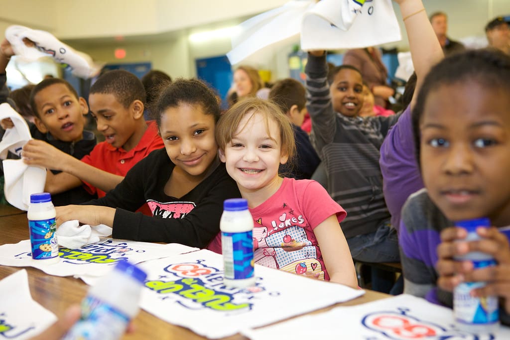 Kids smiling with milk