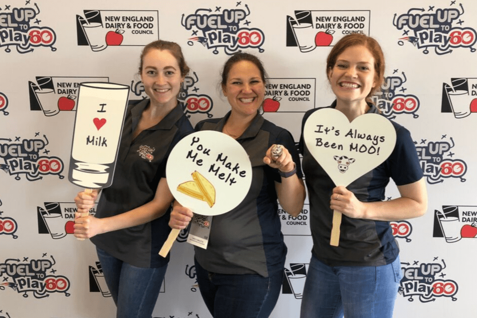 women holding funny signs