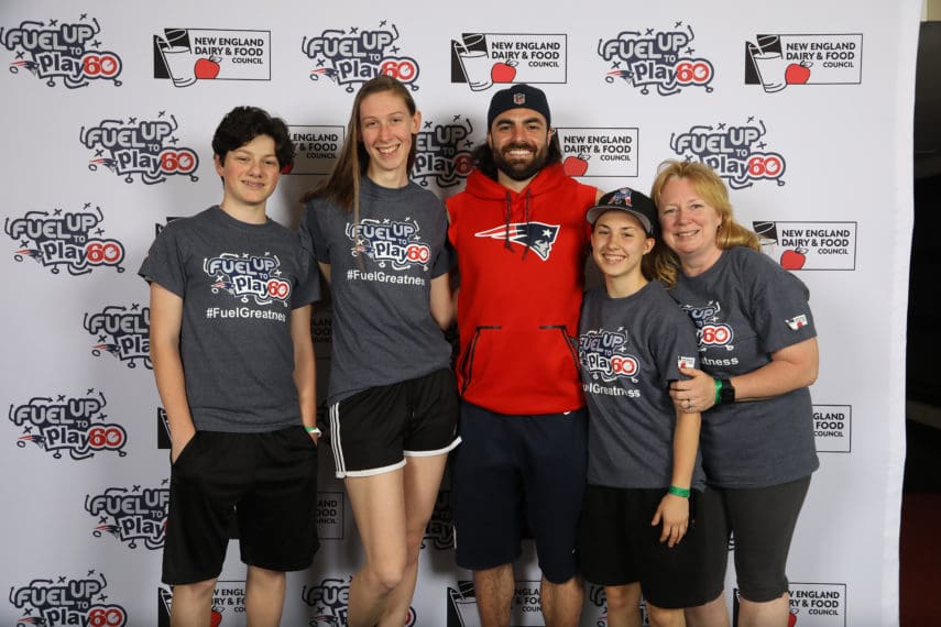 Football player with teens