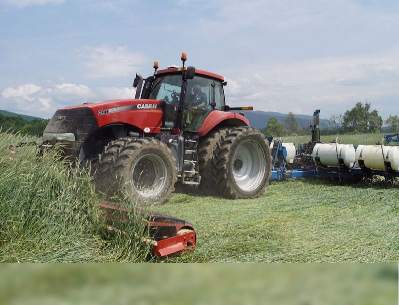 tractor harvesting hay