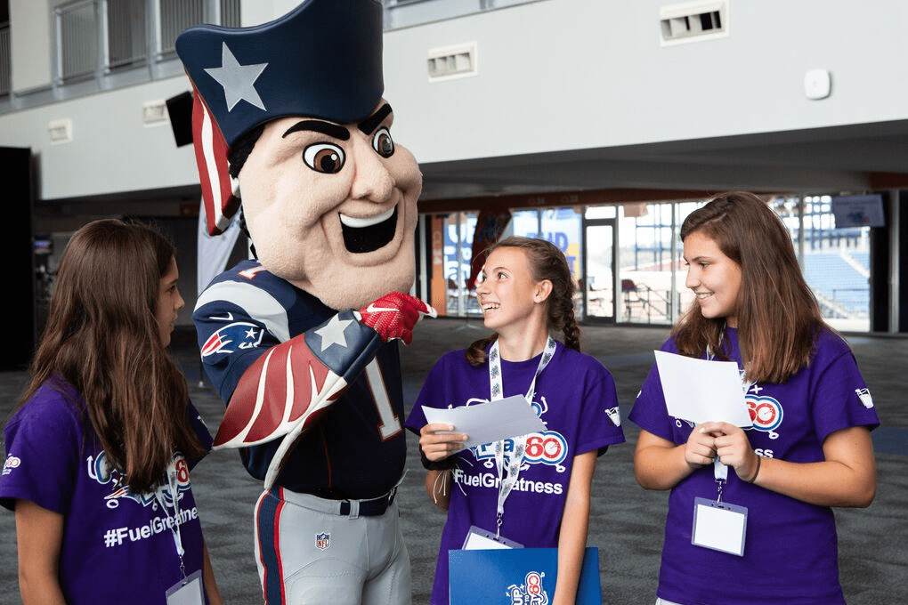 Patriot mascot with teens