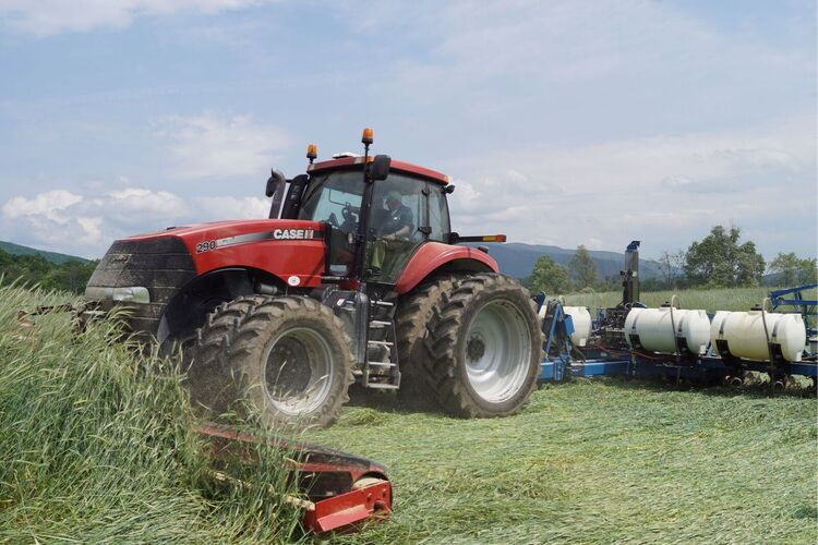 tractor harvesting hay