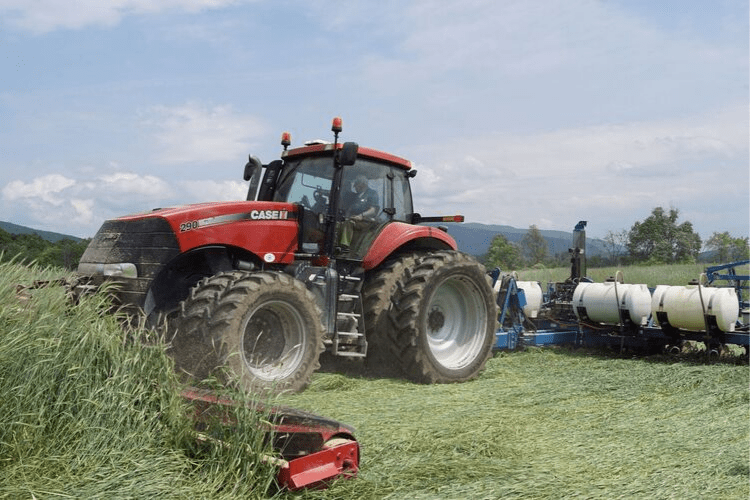 tractor harvesting hay