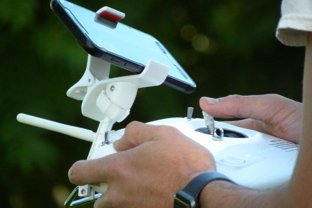 man holding drone